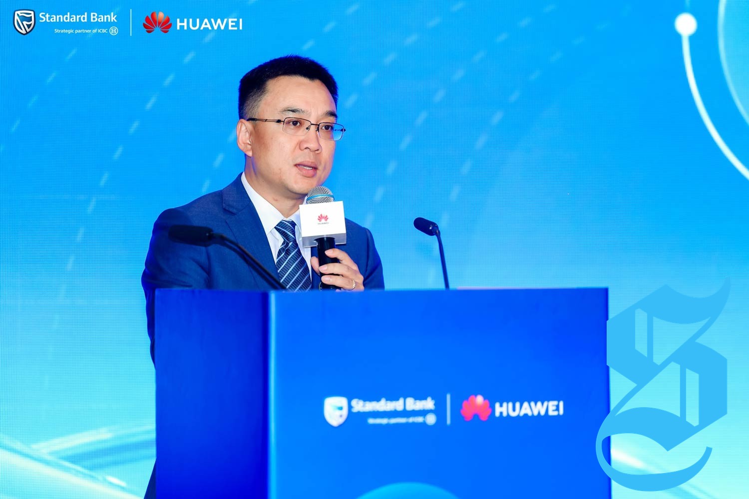 Executives expressing the future vision for Standard Bank and Huawei partnership.