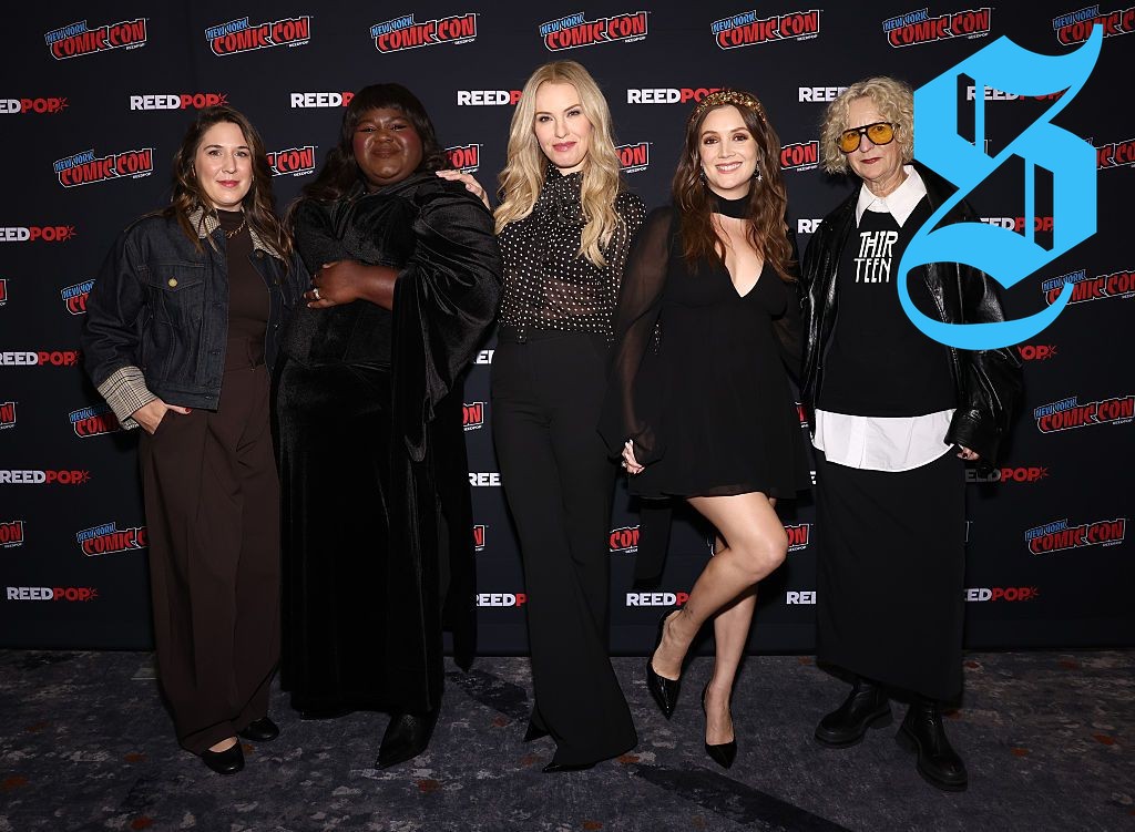 Gabourey Sidibe showcasing a stylish outfit during her fashion tour.