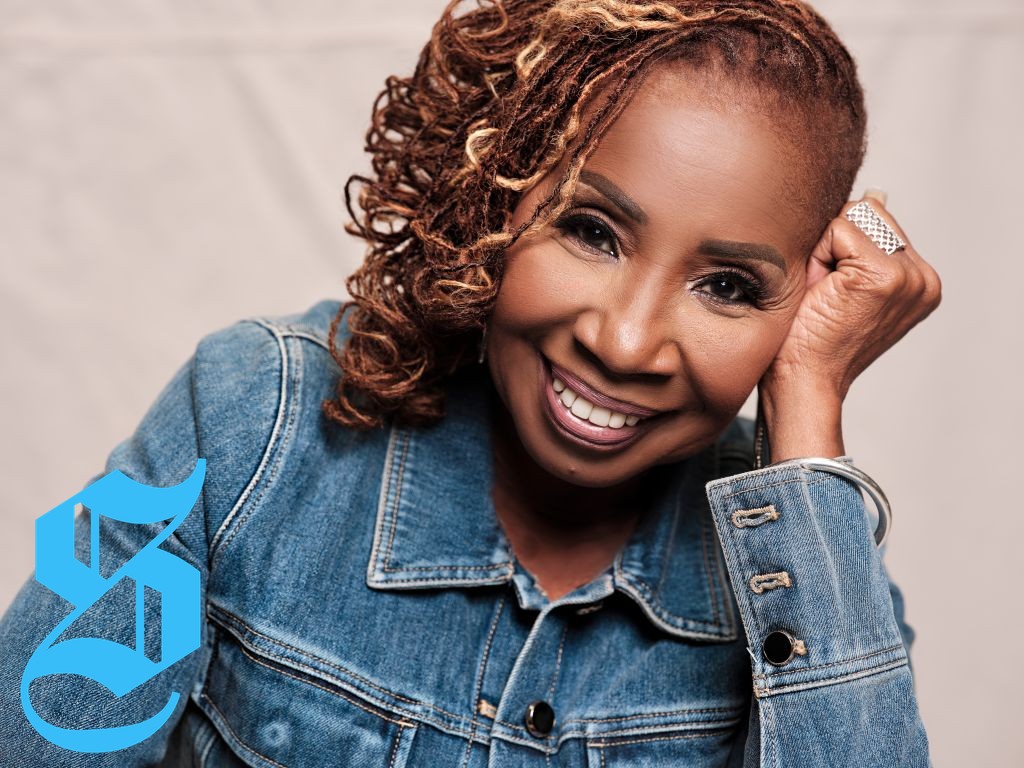 Iyanla Vanzant engaging with mothers and daughters in a heartfelt discussion