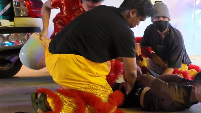 Thai Cops Dance in Lion Costume to Snare Serial Burglar
